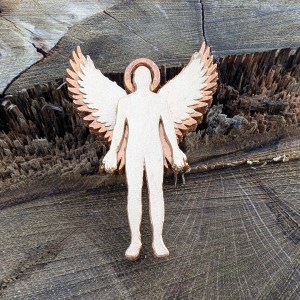 A mixed media charm for a bracelet representing a guardian angel, featuring a gender-neutral human silhouette facing forwards, arms down and to the side with palms forward, with a pair of wings extending outwards behind the shoulders The charm has a pale gold finish with a contrasting coppery gold lower layer at the wing tips. The charm is set against the textures of a tree stump.